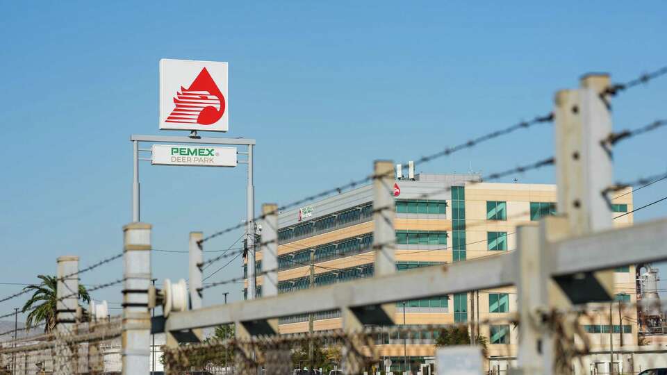 A sign from the Pemex refinery in Deer Park is photographed the morning after a release of the chemical hydrogen sulfide killed at least two refinery workers and injured a minimum of 35 other people, on Friday, Oct. 11, 2024 in Deer Park.