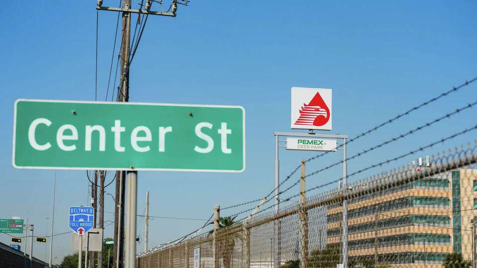 A sign from the Pemex refinery in Deer Park is photographed the morning after a release of the chemical hydrogen sulfide killed at least two refinery workers and injured a minimum of 35 other people, on Friday, Oct. 11, 2024 in Deer Park.