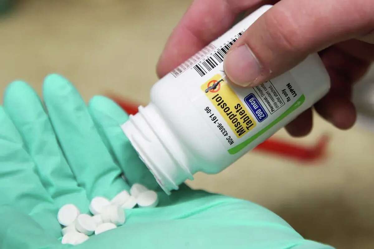 A pharmacist shows pills of Misoprostol at a pharmacy in Provo, Utah, on June 19, 2019.