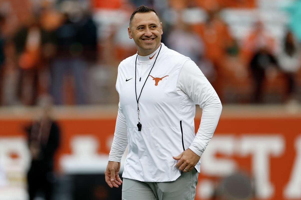 Head coach Steve Sarkisian of the Texas Longhorns watches players warm up before the game against the Baylor Bears at Darrell K Royal-Texas Memorial Stadium on November 25, 2022 in Austin, Texas. 