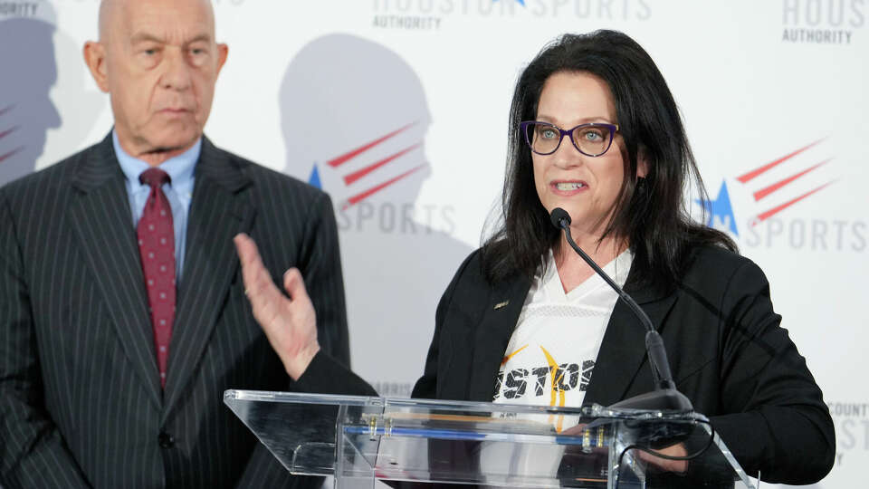 Janis Burke, CEO of the Harris County Houston Sports Authority, speaks alongside Houston Mayor John Whitmire during a press conference addressing safety measures taken at the NCAA football national championship game and surrounding events at the George R. Brown Convention Center, Thursday, Jan. 4, 2024, in Houston.