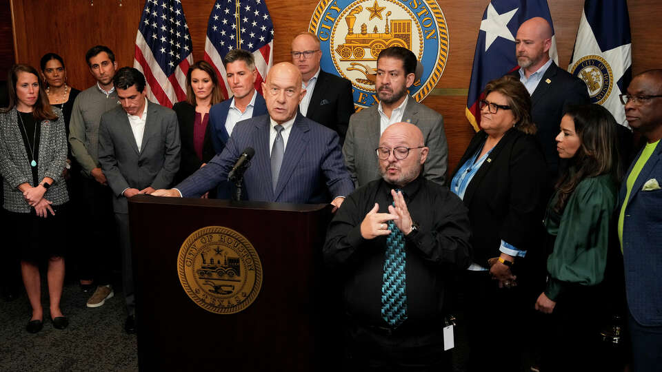 Houston Mayor John Whitmire, center, speaks about the future of the Harris County Houston Sports Authority during a press conference Friday, Oct. 11, 2024 at Houston City Hall in Houston. Behind Whitmire were leaderships from professional sports teams and venues, including Harris County Houston Sports Authority board of directors.