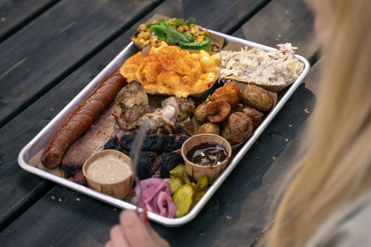 A tray of meats and sides from Miller's BBQ in Hämeenlinna, Finland.