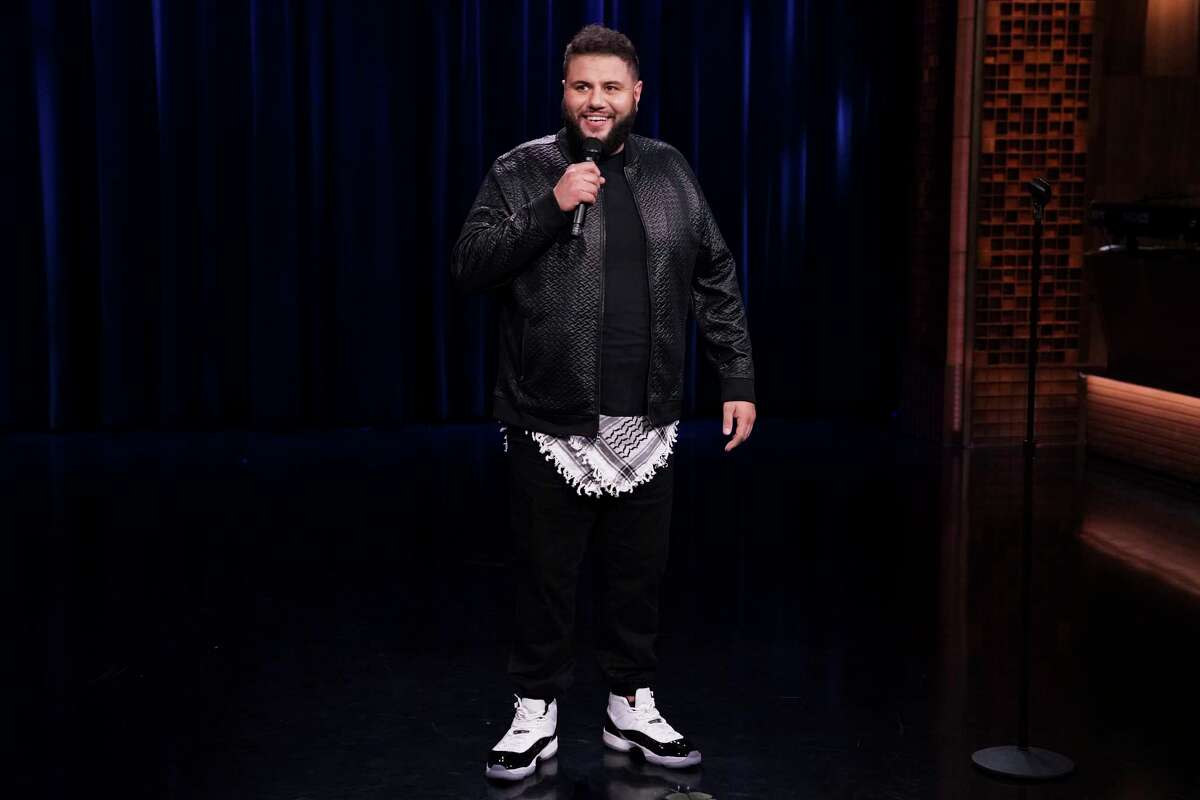 Comedian Mo Amer performs on 'The Tonight Show Starring Jimmy Fallon' on Feb. 20, 2019.