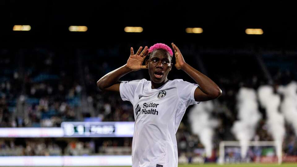 Bay FC forward Asisat Oshoala (8) gestures after scoring the game-winning goal during the second half of her NWSL soccer match against Racing Louisville in San Jose, Calif., Saturday, Sept. 7, 2024. Bay FC defeated Racing Louisville 1-0.