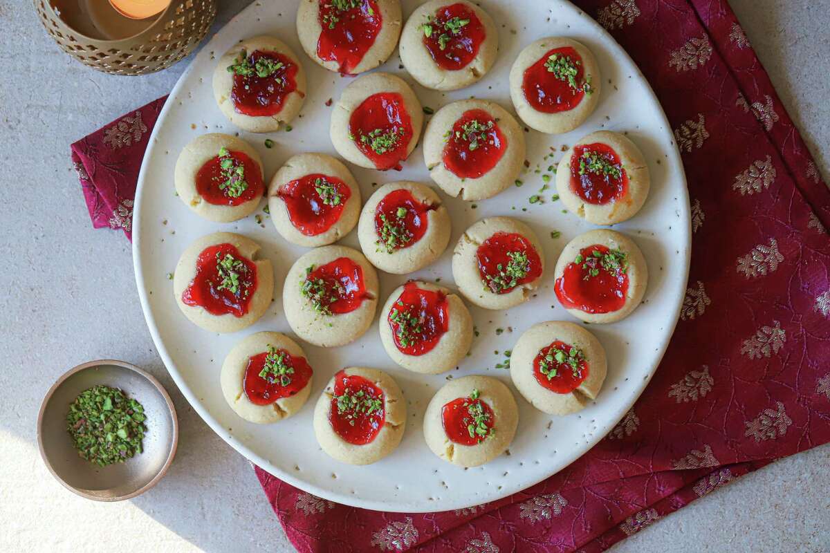 Tangy pluot jam is at the heart of these colorful thumbprint cookies for Diwali