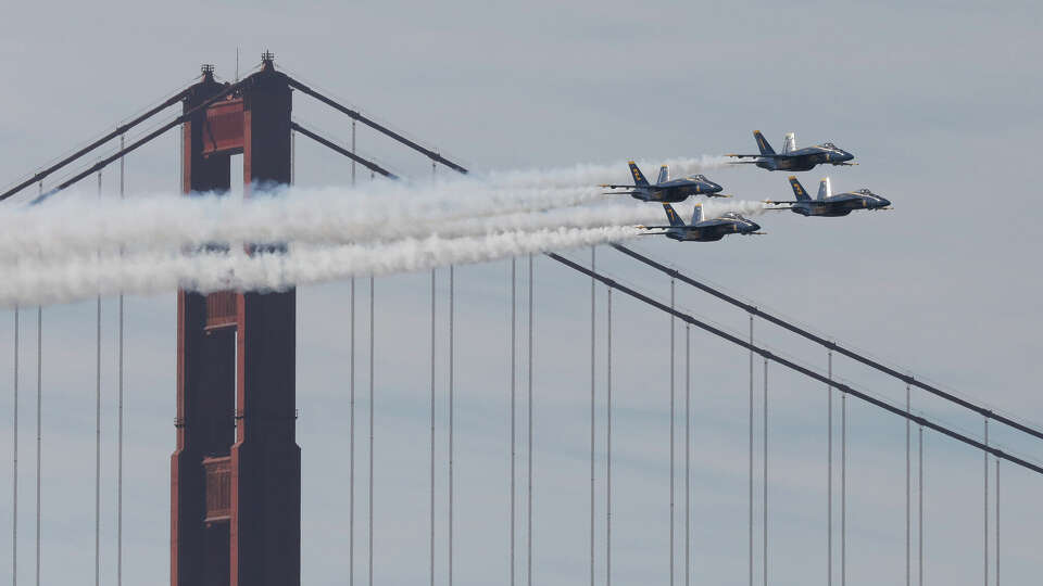 The Blue Angels fly over the Golden Gate Bridge as they perform during the the San Francisco Fleet Week Air Show on Friday, October 11, 2024 in San Francisco, Calif.