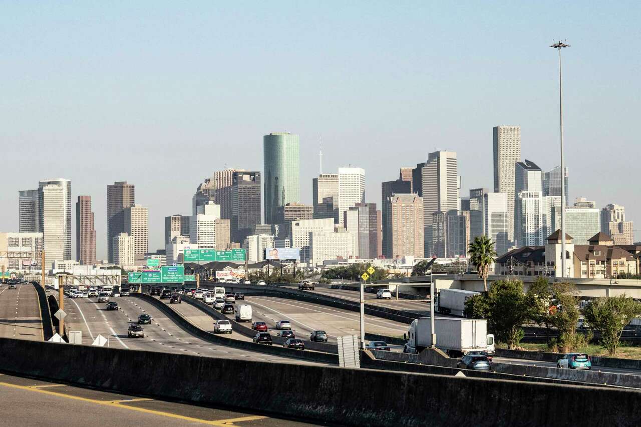 The downtown Houston skyline is visible looking north from Interstate 45 Gulf Freeway south Thursday, Oct. 10, 2024 in Houston.