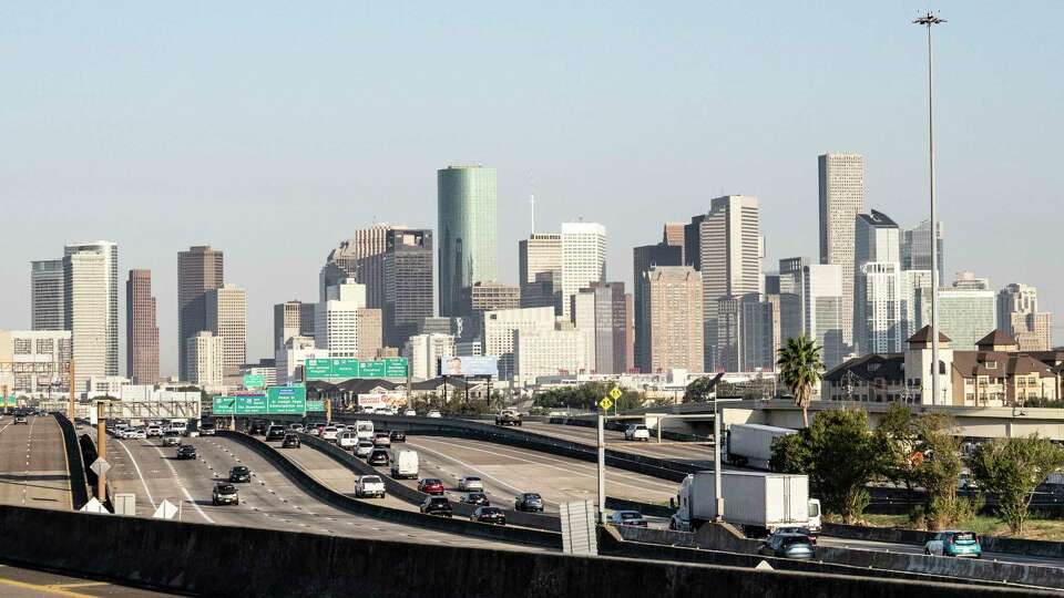 The downtown Houston skyline is visible looking north from Interstate 45 Gulf Freeway south Thursday, Oct. 10, 2024 in Houston.