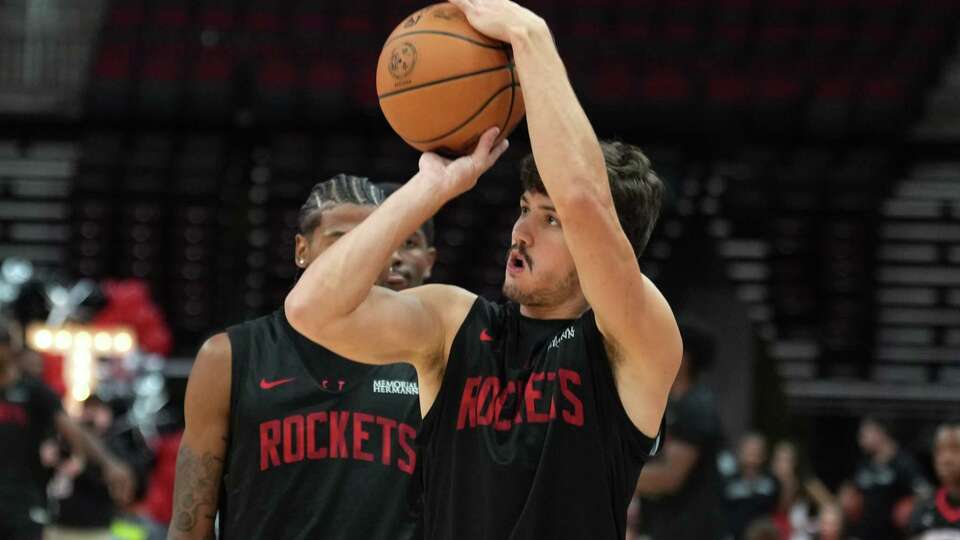 Houston Rockets point guard Reed Sheppard shoots during the team’s open practice Sunday, Oct. 13, 2024, in Houston.