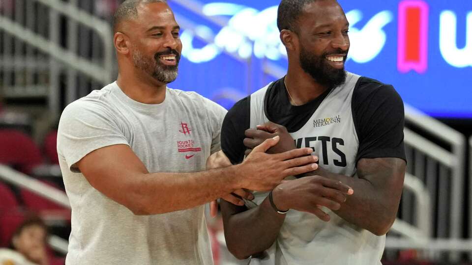 Houston Rockets center Jeff Green, right, jokes with head coach Ime Udoka during the team's open practice Sunday, Oct. 13, 2024, in Houston.