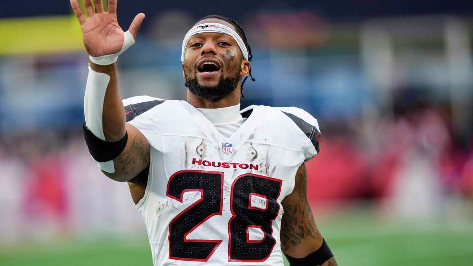 Houston Texans running back Joe Mixon (28) celebrates his 20-yard touchdown run against the New England Patriots during the second half of an NFL football game Sunday, Oct. 13, 2024, in Foxborough, Mass.