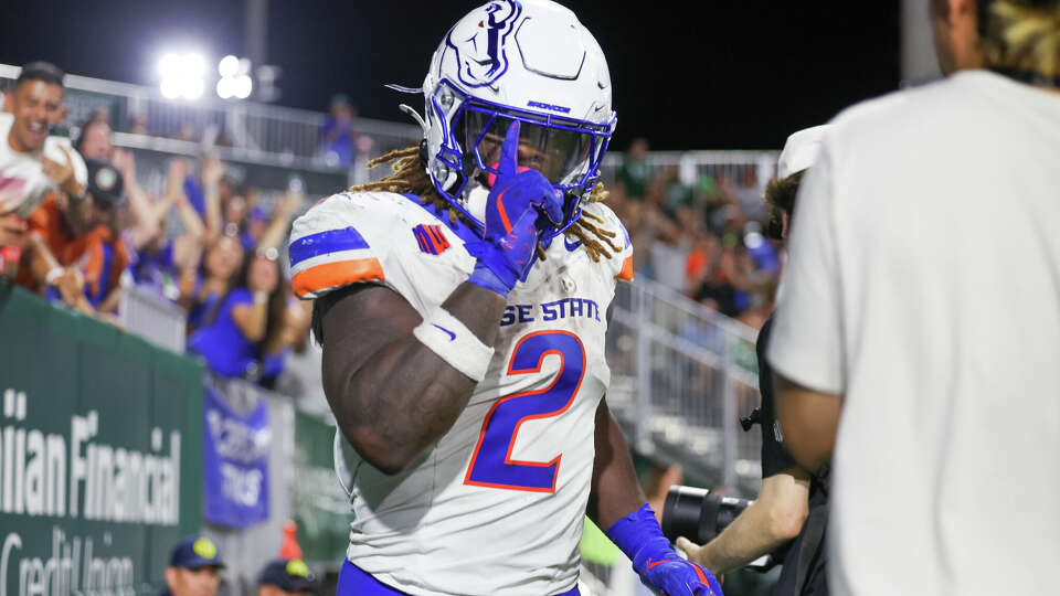 Boise State's Ashton Jeanty celebrates a touchdown against Hawaii.