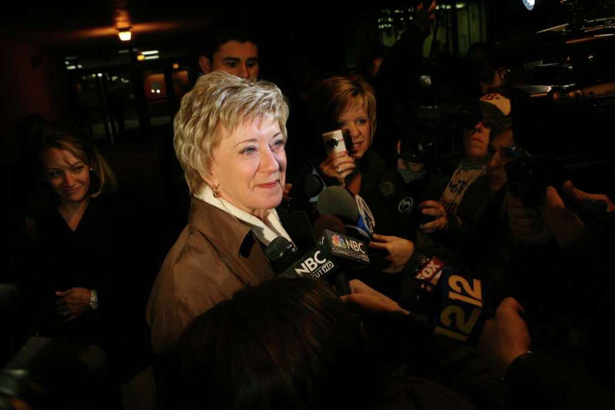 U.S Senate candidate Linda McMahon answers questions from the press after voting at North Street School in Greenwich early Tuesday morning,.
