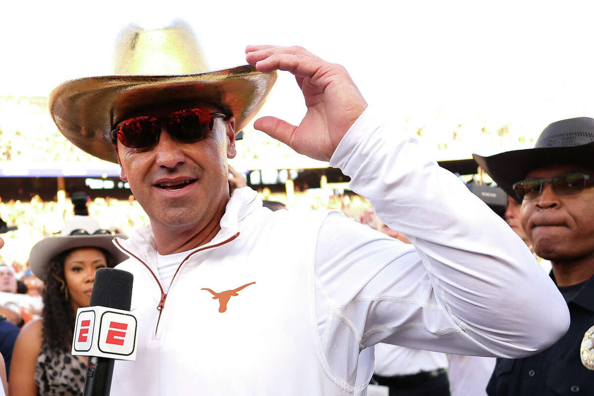 Head coach Steve Sarkisian of the Texas Longhorns wears the Golden Hat Trophy during a postgame interview after defeating the Oklahoma Sooners 34-3 at Cotton Bowl Stadium on October 12, 2024 in Dallas, Texas. 