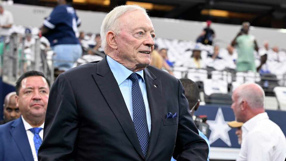 Dallas Cowboys team owner Jerry Jones stands on the field during warmups before an NFL football game against the Detroit Lions in Arlington, Texas, Sunday, Oct. 13, 2024. (AP Photo/Jerome Miron)