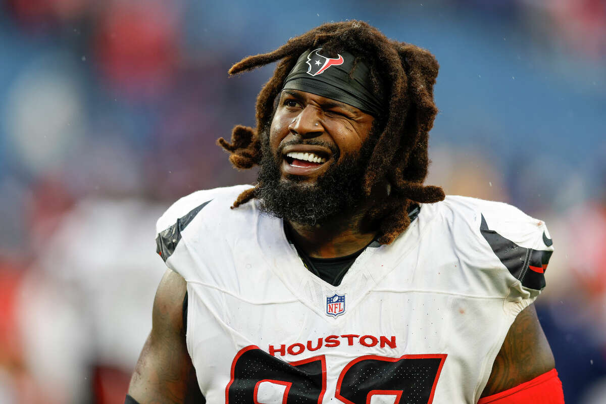 Houston Texans defensive tackle Mario Edwards Jr. (97) reacts after defeating the New England Patriots 41-21 in an NFL football game, Sunday, Oct. 13, 2024, in Foxborough, Mass. 