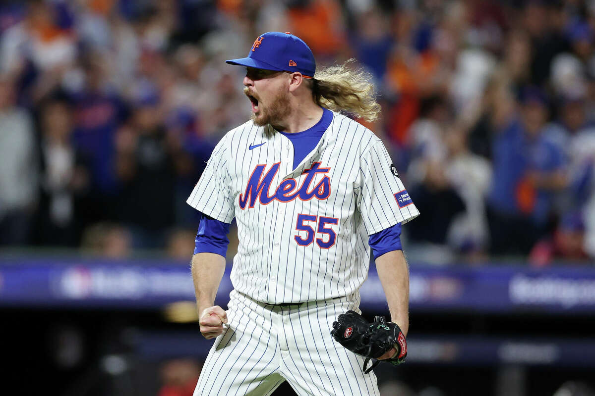 Ryne Stanek #55 of the New York Mets celebrates the last out in the ninth inning against the Philadelphia Phillies during Game Three of the Division Series at Citi Field on October 08, 2024 in New York City. 