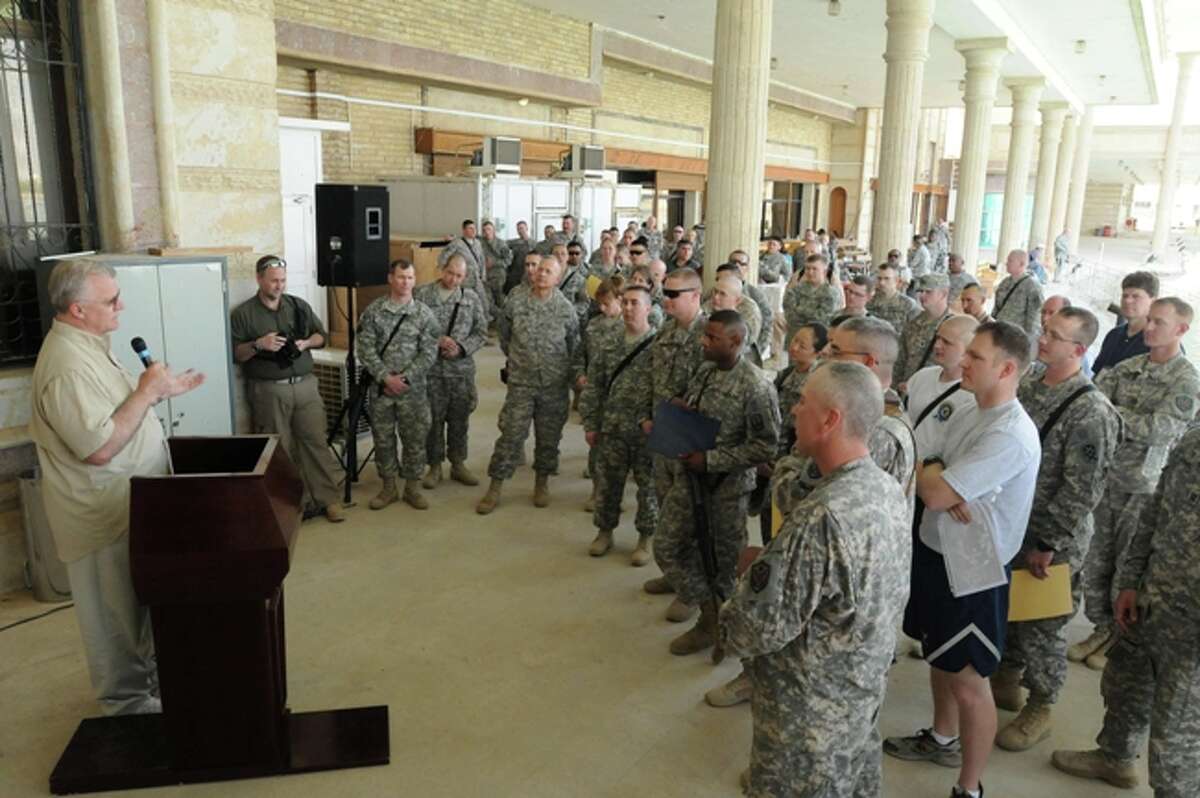 Mike Sherman talks with U.S. troops in Baghdad during his visit there May 5.