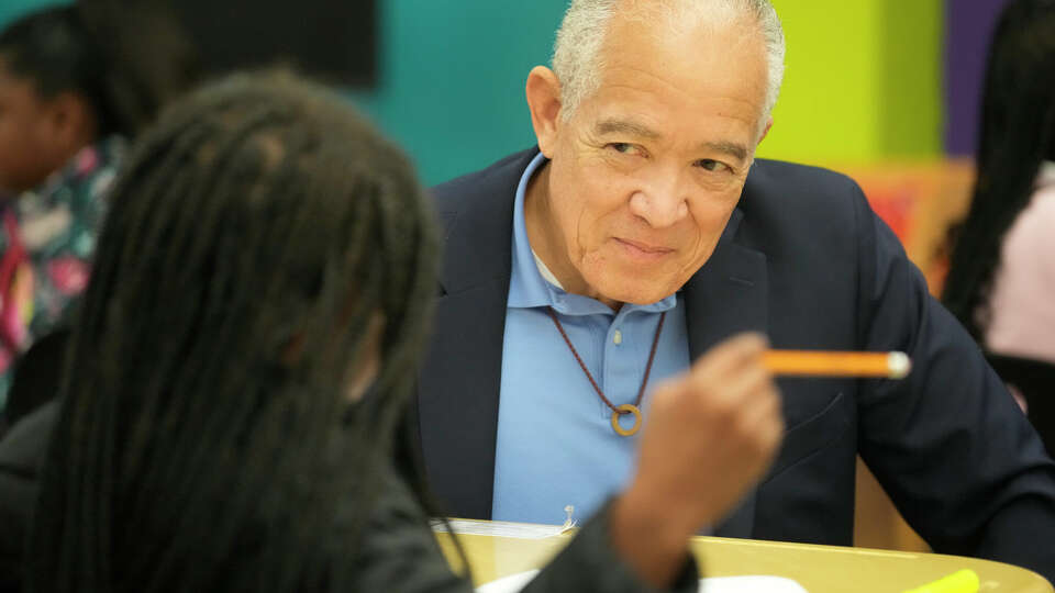 Mike Miles, HISD superintendent, talks with a student at Thompson Elementary School, 6121 Tierwester St., Thursday, April 25, 2024, in Houston.