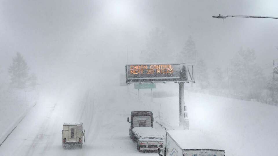 A lone camper truck moves north bound on the I-80 at the Donner Pass Exit on Friday, March 1, 2024, in Truckee, Calif. The most powerful Pacific storm of the season is forecast to bring up to 10 feet of snow into the Sierra Nevada by the weekend. (AP Photo/Andy Barron)