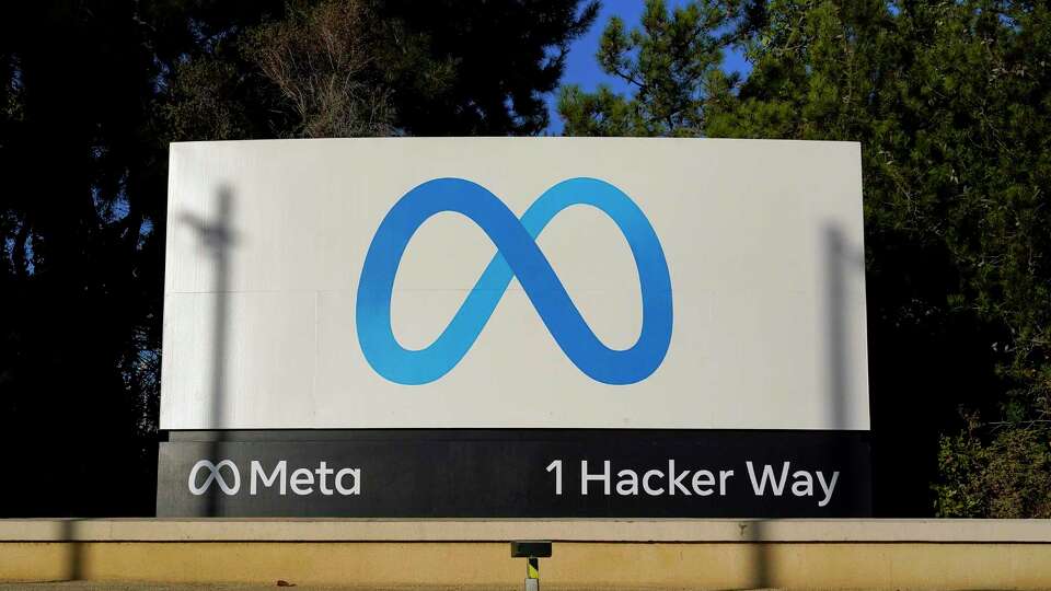 FILE - Meta's logo can be seen on a sign at the company's headquarters in Menlo Park, Calif., Nov. 9, 2022. Meta, which is Facebook's parent company, allowed a Moldovan oligarch with ties to the Kremlin to run ads on its platform urging protests against that country's government — even though he and his political party are subject to U.S. sanctions. (AP Photo/Godofredo A. Vásquez, File)