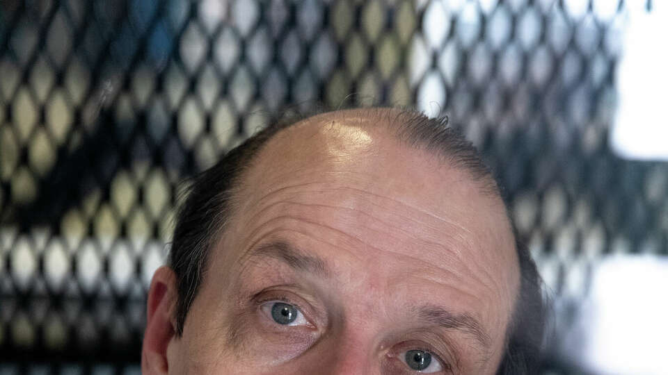 Robert Roberson photographed through plexiglass at TDCJ Polunsky Unit, on Dec. 19, 2023 in Livingston, Texas. (Ilana Panich-Linsman for The Innocence Project/TNS)