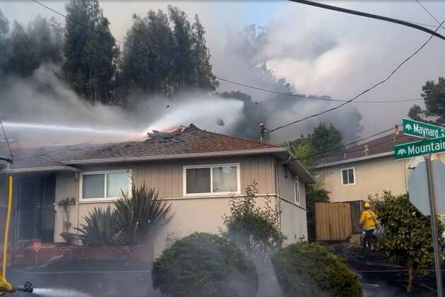 Story photo for Evacuations ordered after Oakland vegetation fire spreads to neighborhood