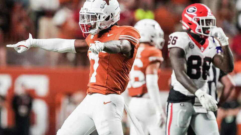 Texas Longhorns defensive back Jahdae Barron (7) reacts after breaking up a pass intended for Georgia Bulldogs wide receiver Dillon Bell (86) during the third quarter of a SEC college football game at Darrell K Royal Texas Memorial Stadium, Saturday, Oct. 19, 2024, in Austin.