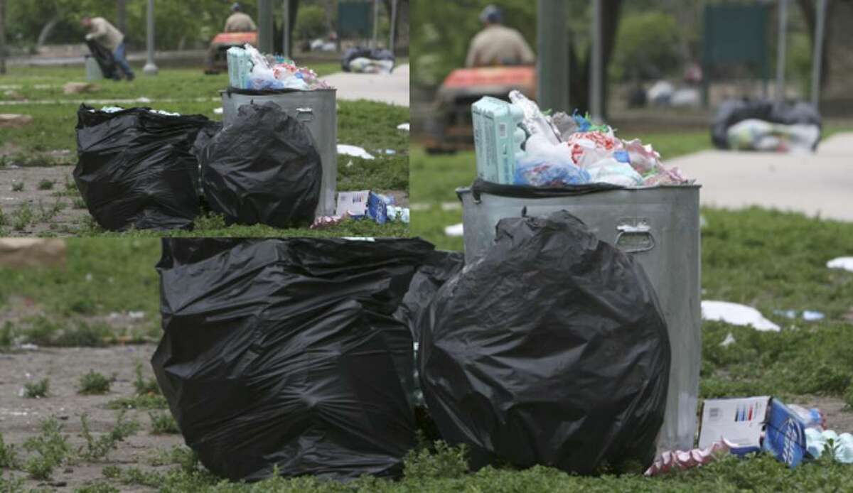 San Antonio Parks and Recreation crews clean up trash at Brackenridge Park on Monday morning after the big Easter weekend celebration there. City crews were on hand for the clean up as well as volunteer organizations.
