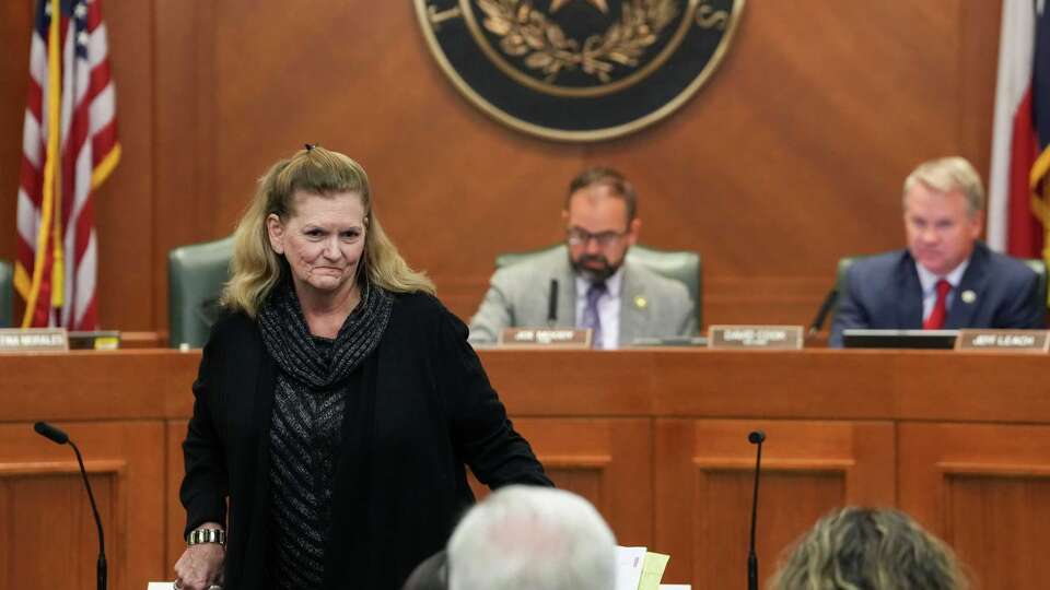 Terre Compton leaves after testifying in a Texas House of Representatives Committee on Criminal Jurisprudence hearing about Robert Roberson on Monday, Oct. 21, 2024, at the state capitol in Austin. Compton was a juror in Roberson’s criminal trial. She said during the hearing that she would not have voted to convict him if she knew what she knows now.