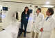CT technologist Kelly Koutinas, left, Dr. David Hsi, center, and Dr. David Klein chat about the features of the new GE Revolution CT Scanner at Stamford Hospital in Stamford, Conn. Oct. 21, 2024. A new artificial intelligence algorithm at Stamford Health's Heart & Vascular Institute is helping doctors identify the first signs of coronary artery disease in patients receiving computed tomography scans, more commonly known as CT scans.Â
