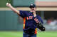 Former Houston Astros pitcher Roy Oswalt throws out the ceremonial first pitch before Game 2 of the American League Championship Series at Minute Maid Park on Thursday, Oct. 20, 2022, in Houston. (Photo by Brett Coomer/Houston Chronicle via Getty Images)