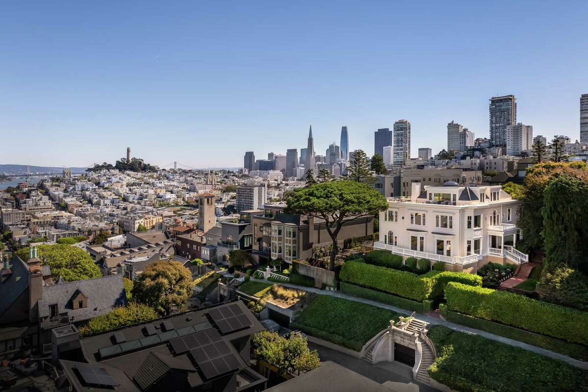 Images of the real estate listing feature the historic property located at 825-845 Francisco Street in Russian Hill, once owned by the late financial investor Sandy Roberts. It's one of the oldest properties in San Francisco.