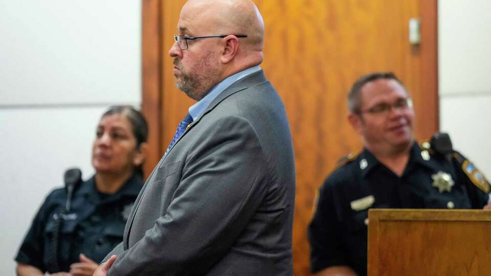 Garrett Hardin, a former Harris County sheriff's deputy, stands in the courtroom during the murder trial against him on Wednesday, Oct. 24, 2024, in Houston. Hardin faces a murder charge in connection with a July 2022 shooting death of Roderick Brooks. Brooks was accused of shoplifting from a Dollar General.