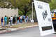 People wait to vote Tuesday, Nov. 8, 2022 at the Brook Hollow Branch Library during the midterm elections.