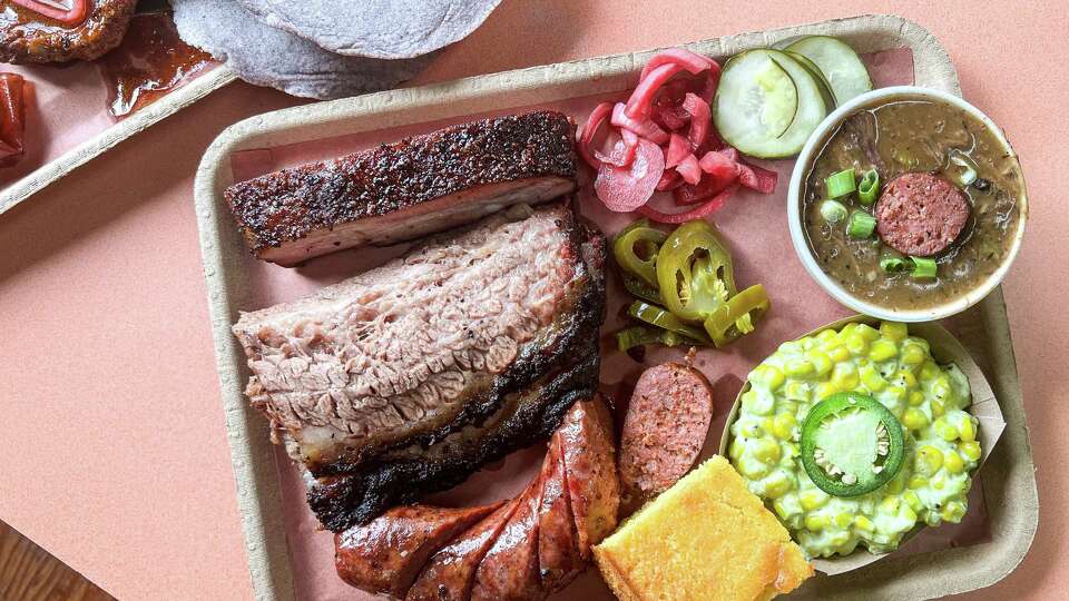 Sausage, brisket, pork ribs, BBQ gumbo, cream corn and cornbread at LaVaca BBQ, Port LaVaca