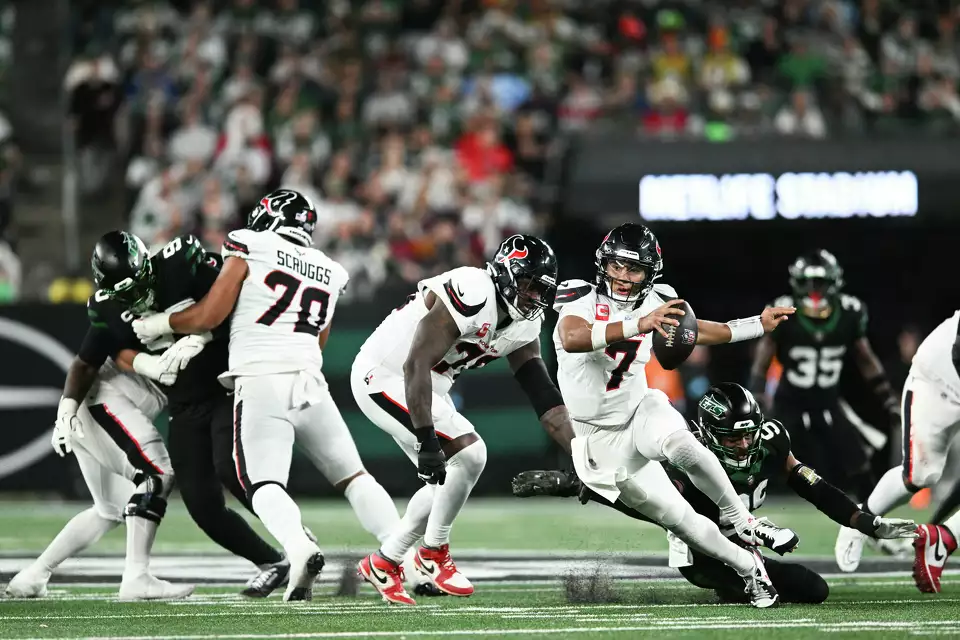 C.J. Stroud #7 of the Houston Texans runs with the football during the third quarter against the New York Jets at MetLife Stadium on October 31, 2024 in East Rutherford, New Jersey.u00a0