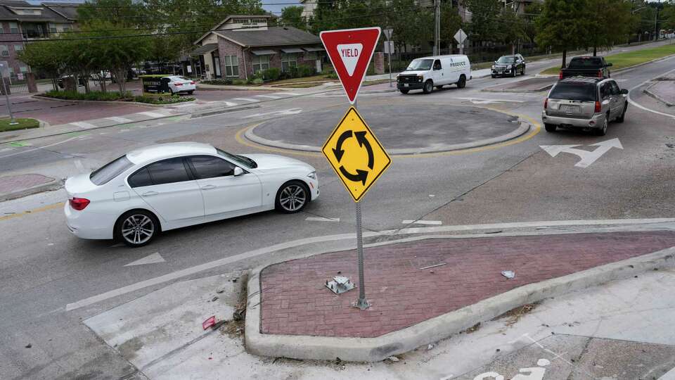 Traffic moves through a roundabout Saturday, Nov. 2, 2024, at the intersection of Irvington Boulevard and Patton Street in Houston.