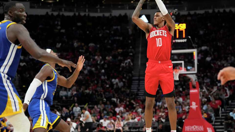 Houston Rockets forward Jabari Smith Jr. (10) shoots a shot during the second half of an NBA basketball game at Toyota Center on Saturday, Nov. 2, 2024, in Houston.