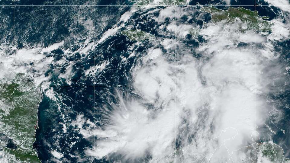 Tropical Depression Eighteen is seen from Space Monday morning as it develops in the Caribbean. 