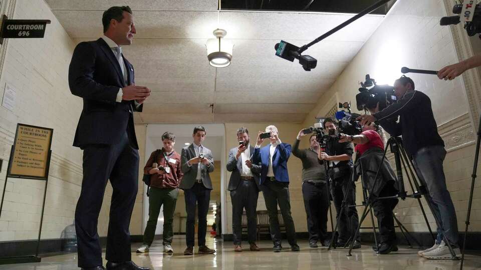 America PAC lawyer Chris Gober speaks with members of the media ahead of a hearing at a City Hall courtroom in Philadelphia, Monday, Nov. 4, 2024.