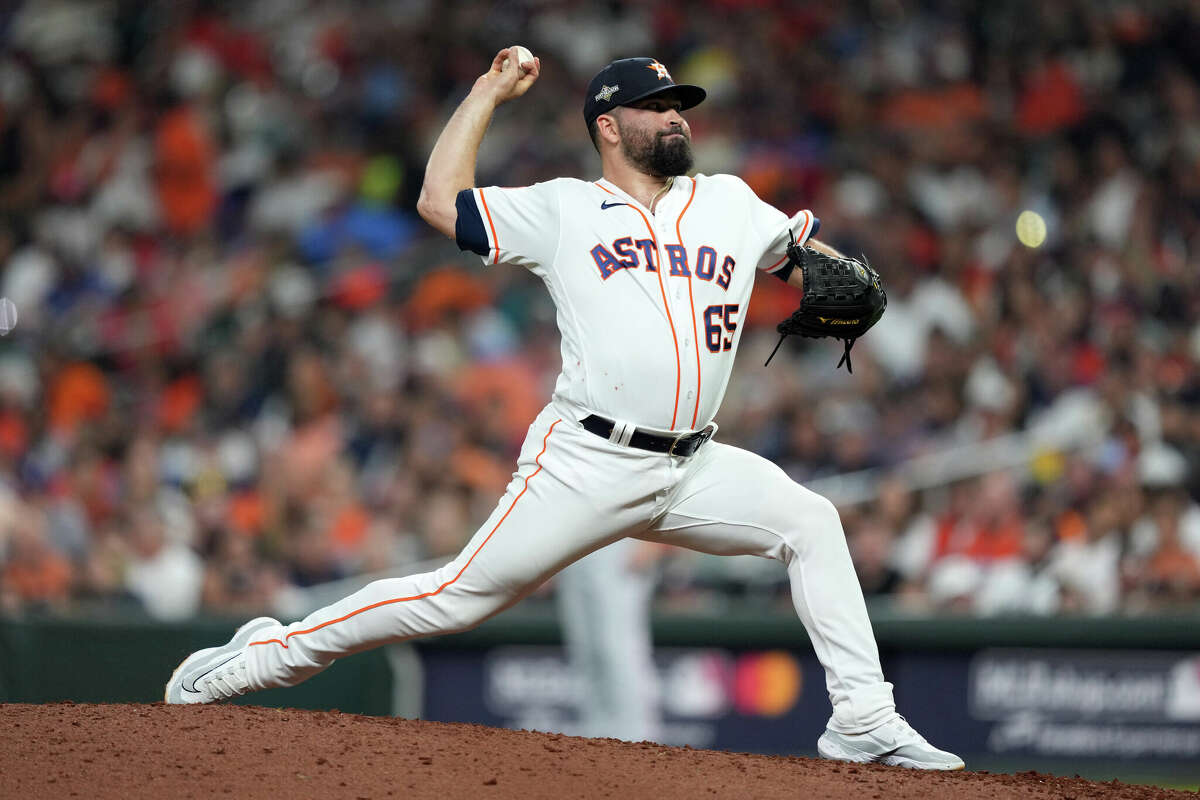 JosÃ© Urquidy #65 of the Houston Astros pitches in the seventh inning during Game 7 of the ALCS between the Texas Rangers and the Houston Astros at Minute Maid Park on Monday, October 23, 2023 in Houston, Texas.