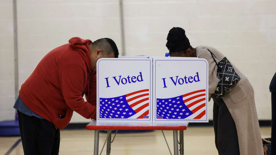 Voters turn out to cast their ballots at Turn of River School in Stamford.