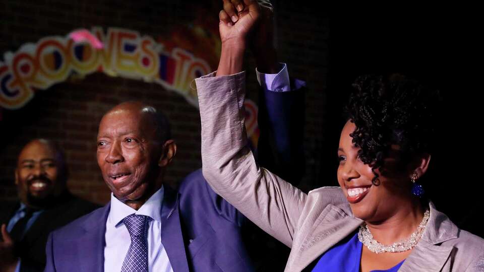 Texas District 18 representatives elect Sylvester Turner, left, and Erica Lee Carter take the podium for their victory speeches at the of combined watch party for the candidates Turner, Carter and Rodney Ellis, held at Grooves of Houston Tuesday, Nov. 5, 2024 in Houston.