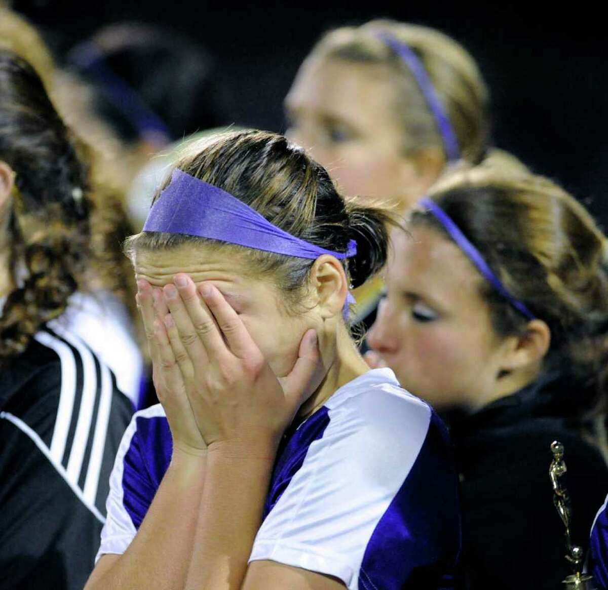 A Westhill player buries her head in her hands during the 2010 Girls FCIAC Soccer Championship between Greenwich High School vs. Westhill High School at Norwalk High School, Wednesday night, Nov. 3, 2010. Greenwich defeated Westhill, 1-0.
