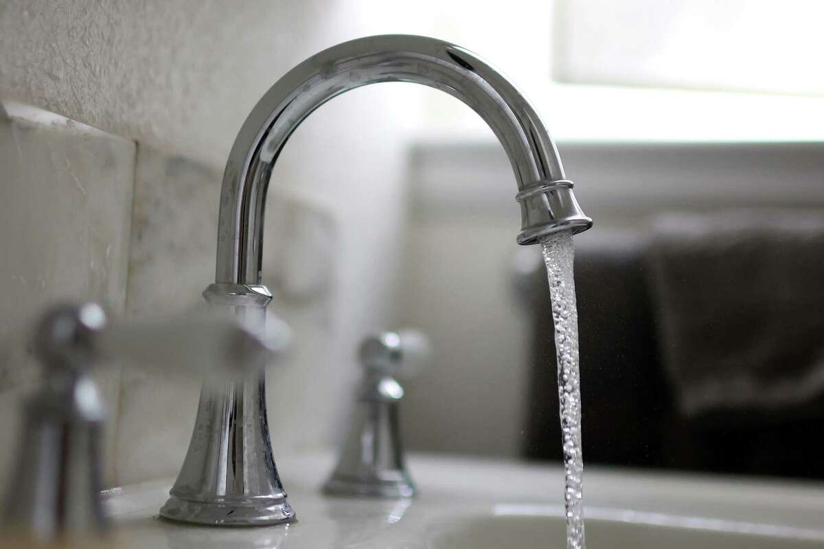 In this photo illustration, water flows from a tap on July 6, 2023, in San Anselmo, California. According to a study by the US Geological Survey, nearly half of the tap water in the United States is contaminated with 'forever chemicals' that are considered dangerous to human health. Per and polyfluorinated alkyl substances, or PFAS, are chemicals that linger in the body and are linked to health issues like cancer, obesity, liver damage, decreased fertility, thyroid disease, high cholesterol and hormone suppression.??