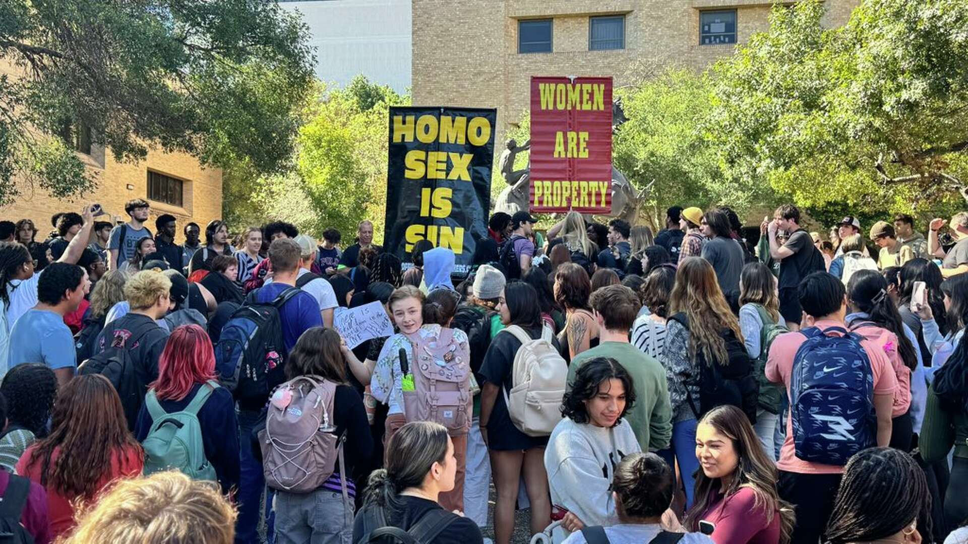 Texas State protest: 'Homo sex is sin,' 'women are property'