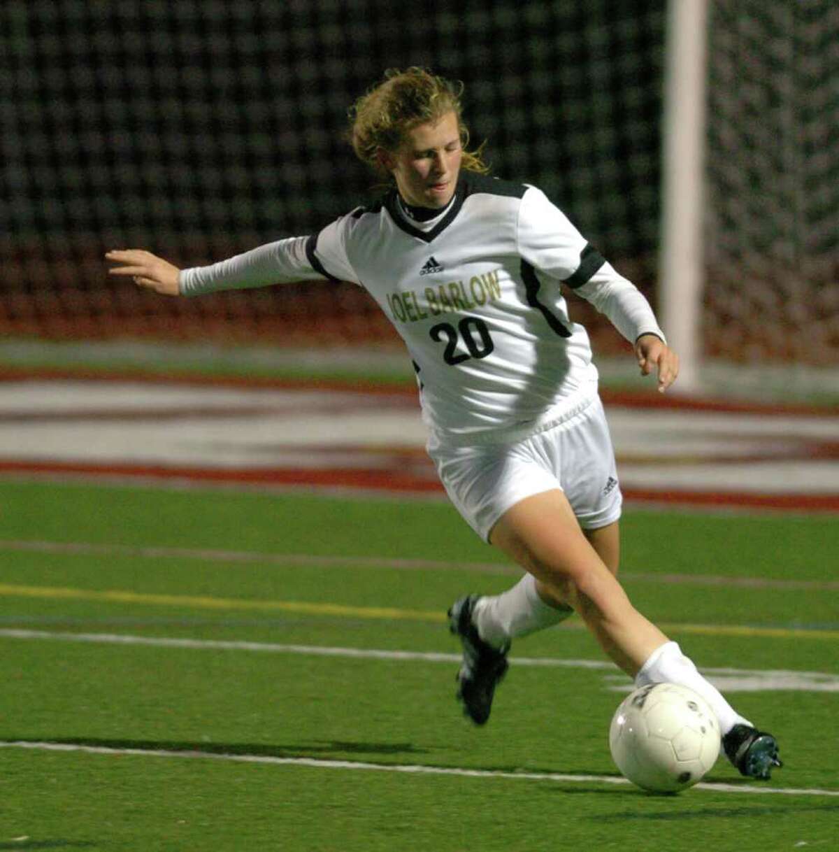 Joel Barlow's 20, Kelly Haines, makes a pass during the girls soccer game against Bunnell, at Southbury High School Nov. 4, 2010.