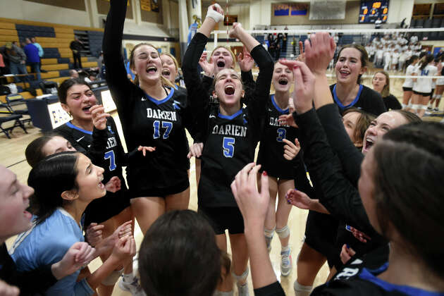 Story photo for Darien volleyball rallies past Glastonbury to earn Class LL three-peat